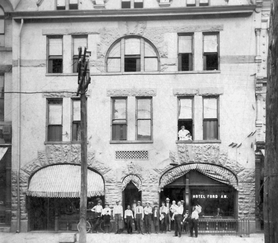 Men in front of Fordham Hotel Paris.JPG